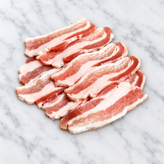 Raw sliced Mangalitsa bacon on white marble; AI-assisted background edit of owned product photo